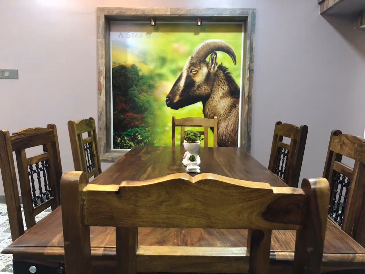 Cozy dining area at Pentoz Hotels Ooty with comfortable tables