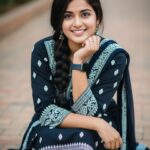 Smiling hospitality representative of Pentoz and Star Gate Hotels, welcoming guests with friendly service in Ooty